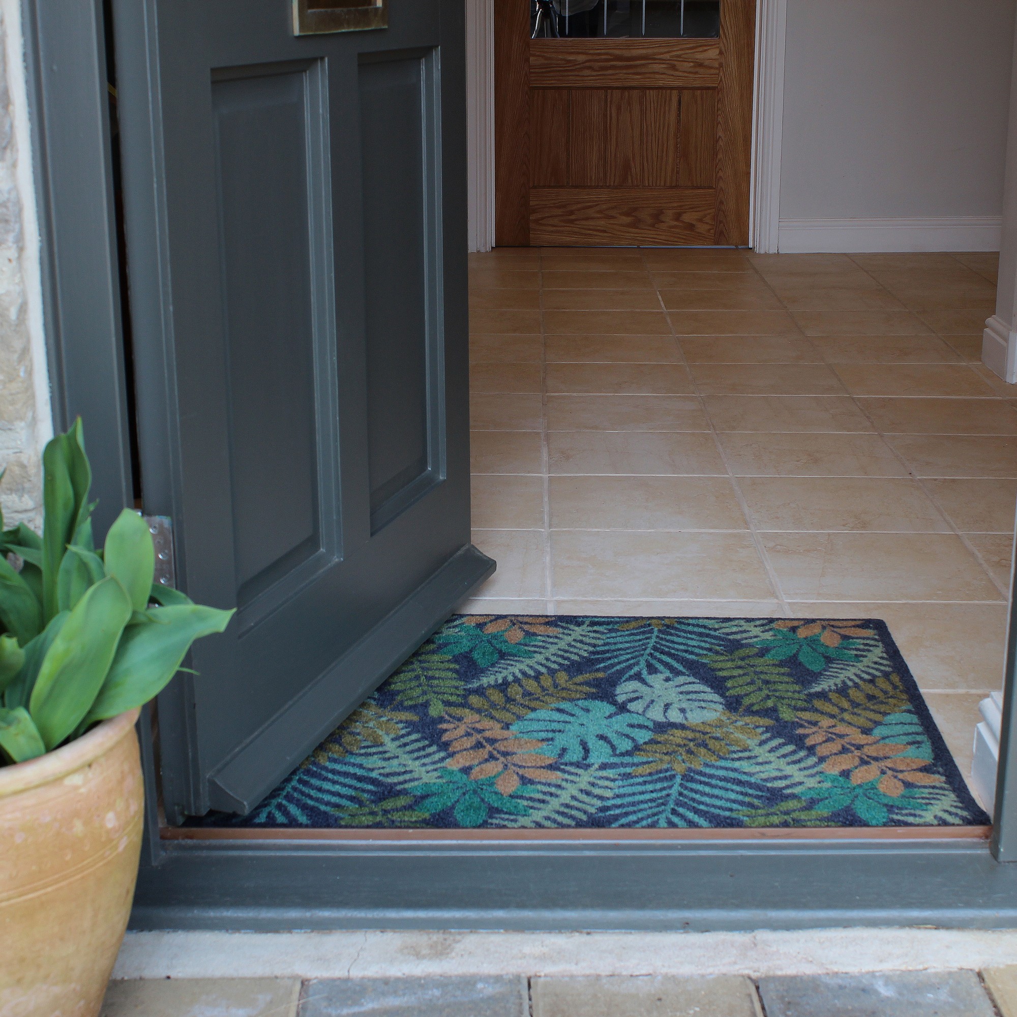 Tropical Leaves Washable Recycled Doormat In Green Multi